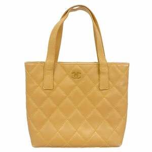 CHANEL Cream Lambskin Leather Bag